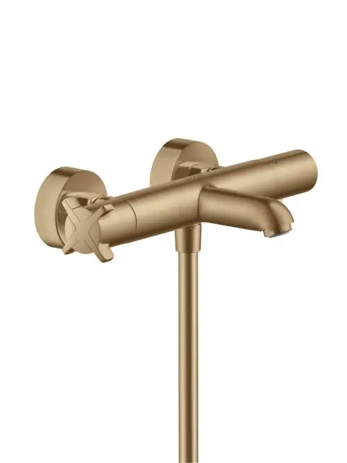 Wandmontierter Thermostat mit Auslauf in gebürstetem Bronze-Finish von AXOR. Zwei Bedienelemente zur Steuerung von Wasserfluss und Temperatur.